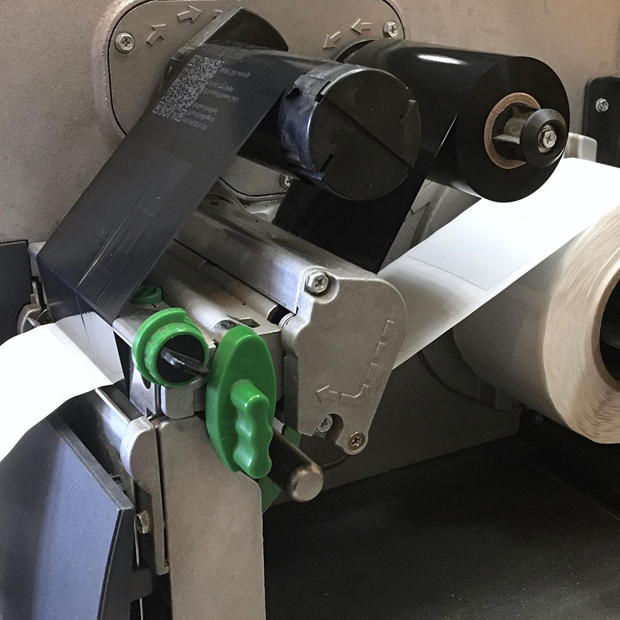 Roll labels and packaging materials